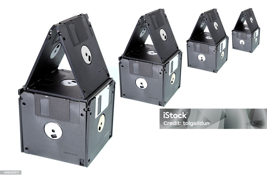 Mortgage Concept by House-shaped Floppy Disks Finance Stock Photo