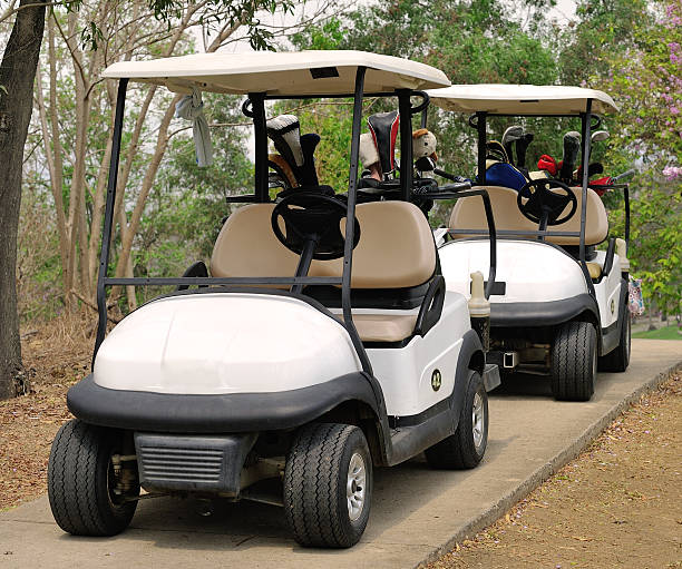 istock Golf cart or club car at golf course 498556559