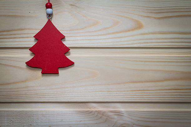 istock Christmas wooden background decorated with a toy. 498558614