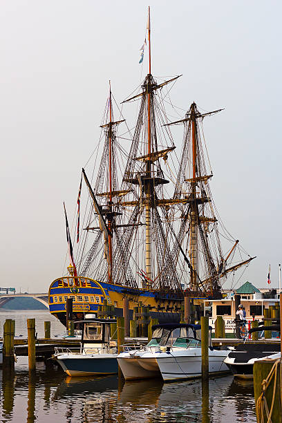 The famous frigate moored at Alaxandria pier. Alexandria, USA – June 10, 2015: Hermione, a famous replica of La Fayette’s Frigate in Alexandria on June 10, 2015.  godspeed stock pictures, royalty-free photos & images