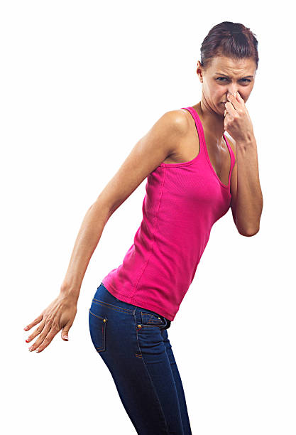 Unpleasant odors http://i1364.photobucket.com/albums/r725/hofi99/UJBANNER2/andrea_banner_zps2cf1a621.jpg holding nose stock pictures, royalty-free photos & images