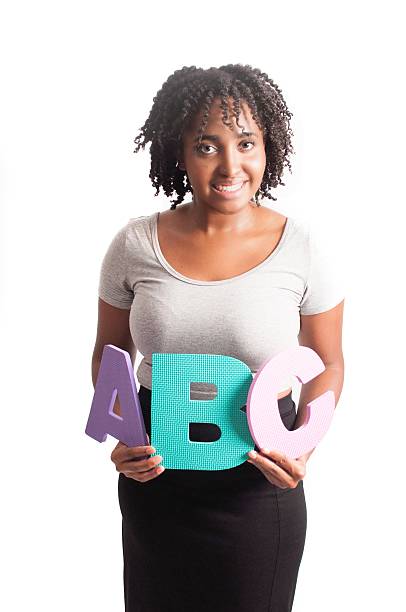 School Teacher holding ABC stock photo