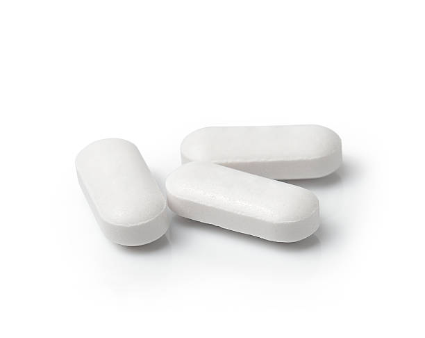 istock Medical pill tablet isolated on white background 498568273
