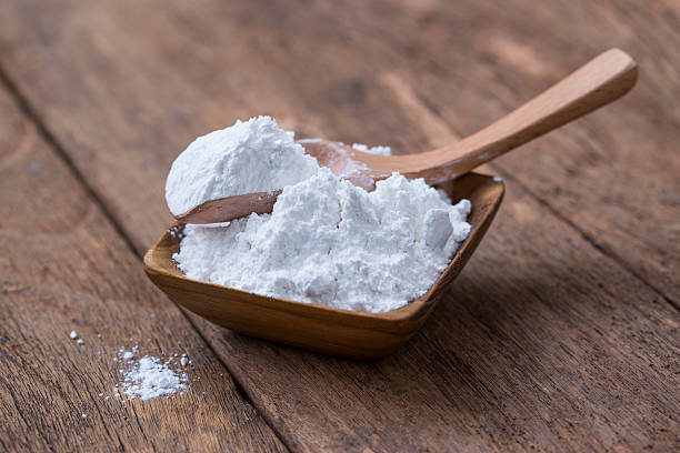 istock flour in wooden bowl 498569035