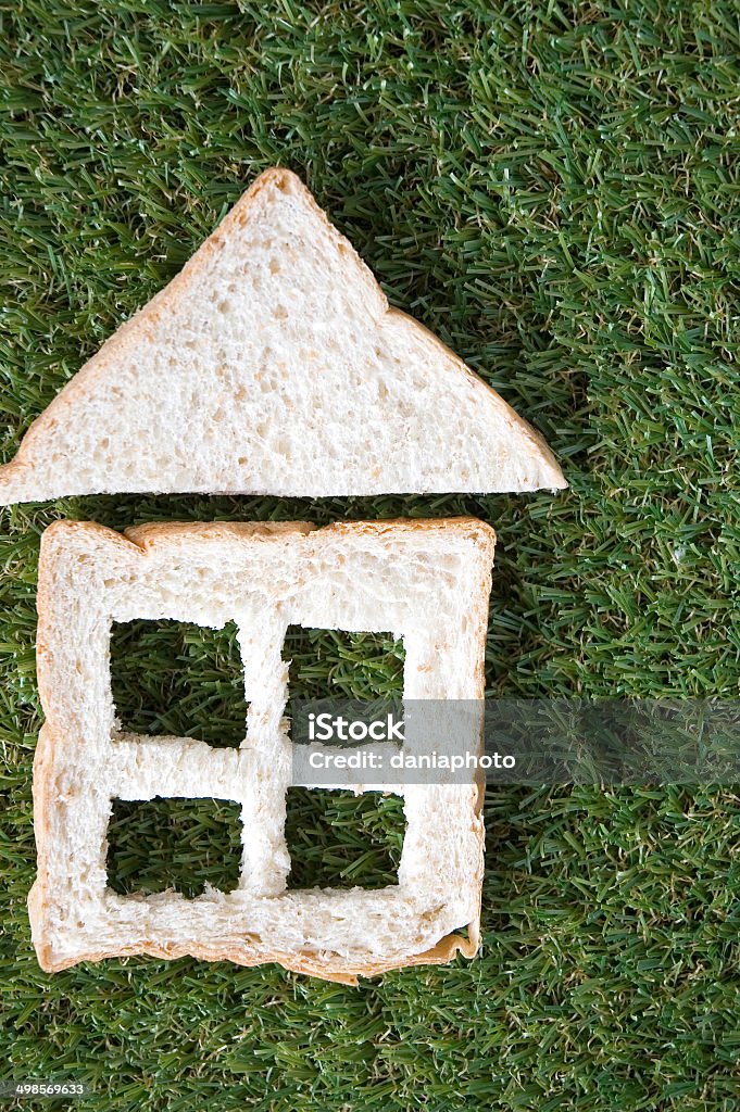 house made from bread house made from bread on grass Abstract Stock Photo