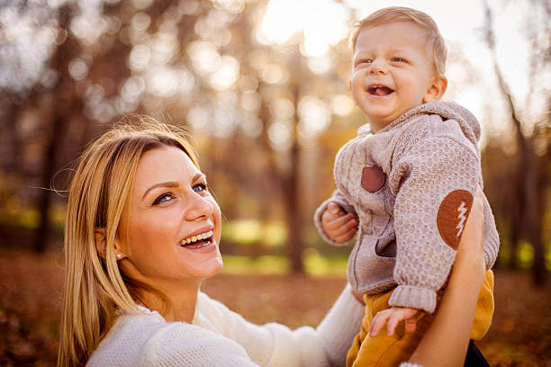istock Happy woman and her little son having fun 498570692