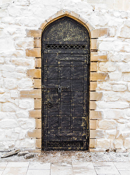 istock Ancient door in the oriental style 498571056
