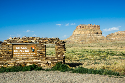 Entrance sign at the remote New Mexico World Heritage Site preserving ancient Indian ruins.