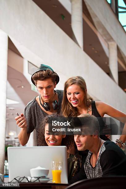Urban Young People Using Laptop Stock Photo - Download Image Now - 20-24 Years, Adolescence, Adult