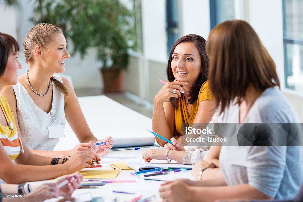 Seminar for women Group of happy women attending a semiar. Cooperation Stock Photo