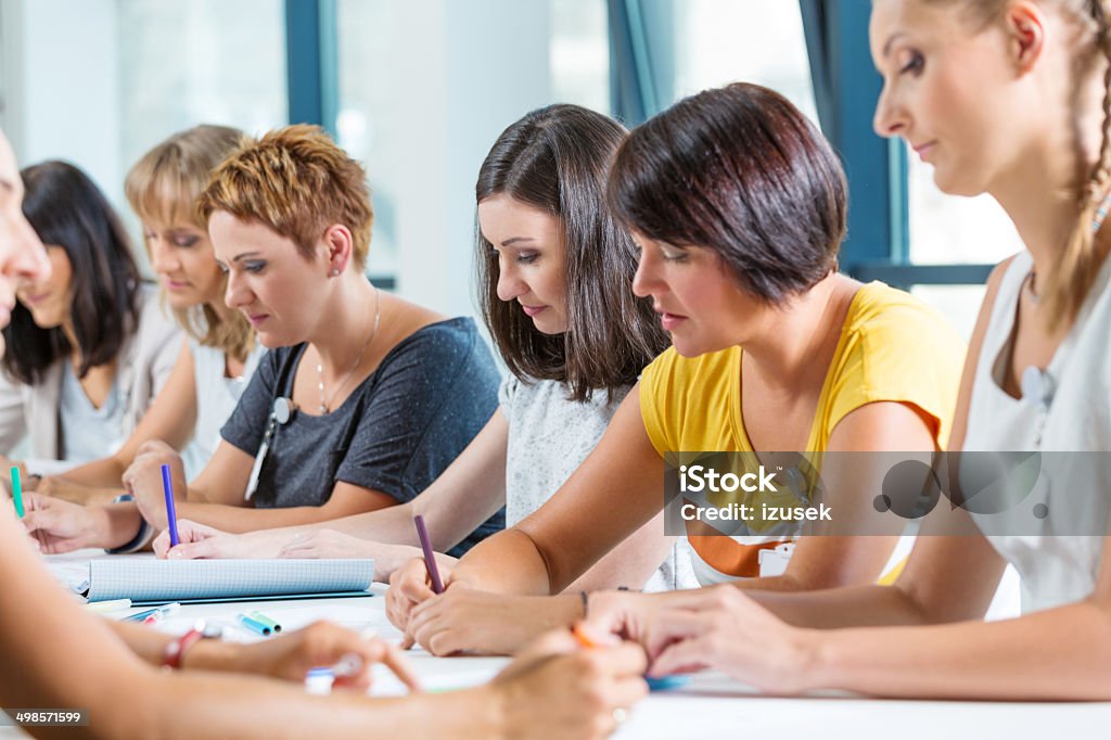 Group of women at the training Group of women attending a training, working together. 30-39 Years Stock Photo