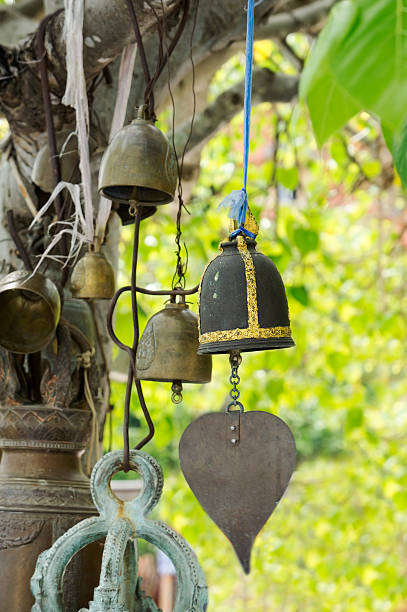 istock Buddhist bells  hanging on a tree branch mascots in Thailand 498572795