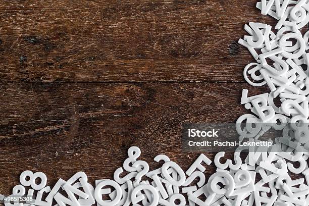 English Alphabet Background With Space On Wood Texture Stock Photo - Download Image Now