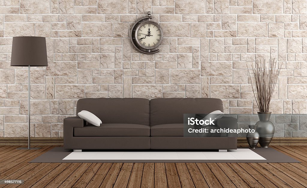 Modern sofa in a retro room Retro room with stone wall and modern brown sofa - rendering Arts Culture and Entertainment Stock Photo