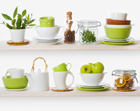 Shelves with various food ingredients and kitchen utensils