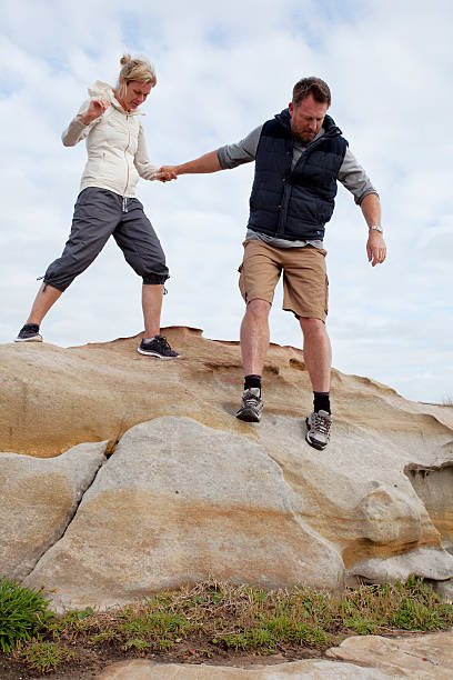 istock Active mature couple by the beach 498578018