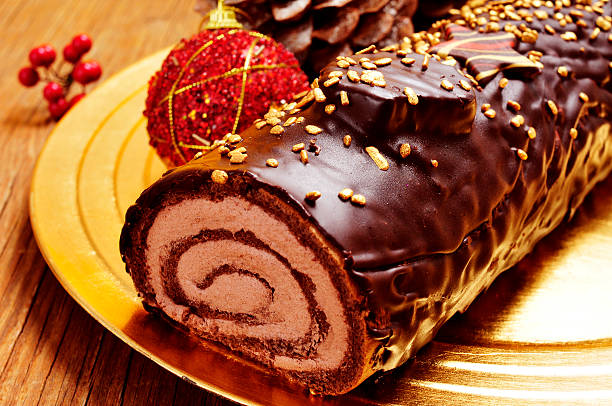 istock yule log cake, traditional of christmas time 498578948