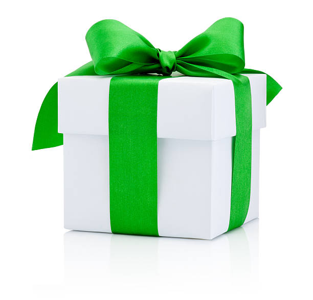 istock White gift box tied green ribbon Isolated on white background 498579104