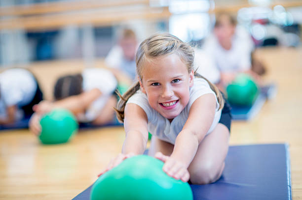 istock Stretching with Blow Up Balls 498579456