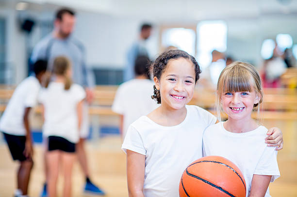 Friends Playing Basketball Together