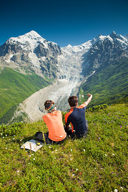 istock Hiker take a rest during hiking in Caucasus mountains, Georgia 498580098