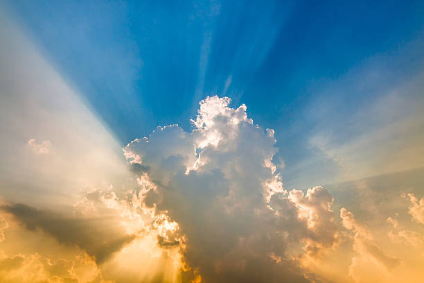 istock ray of sunshine on a cloudy sky 498580660