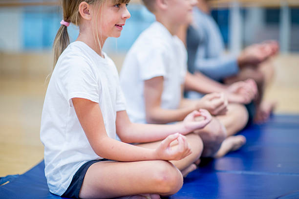 istock Family Meditating Together 498580998