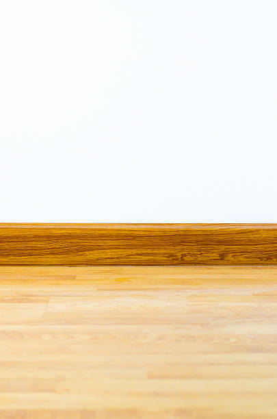 istock interior perspective with color  wall ,brown trim and wood parquet 498581121