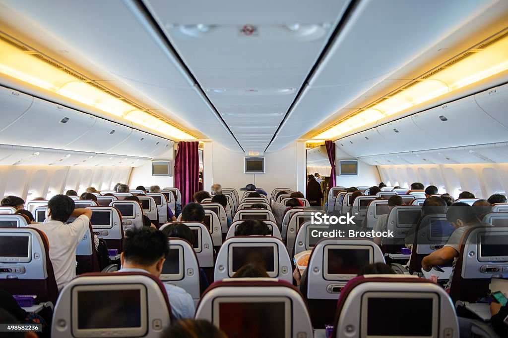 Aircraft interior Inflight image of an aircraft interior. Airplane Stock Photo