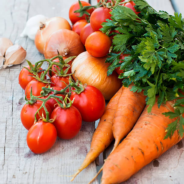 istock Autumn vegetables on the table - tomatoes, peppers, eggplant, zu 498583308