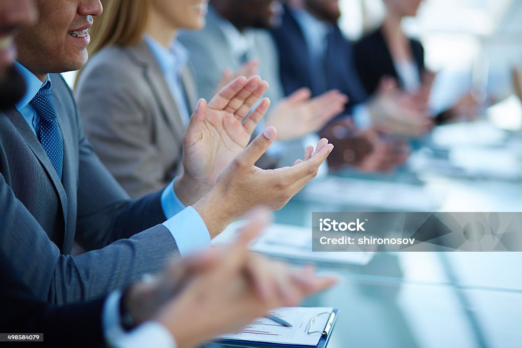 Congrats Young business partners applauding to reporter after listening to presentation at seminar Clapping Stock Photo