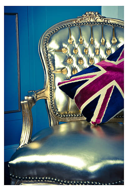 istock Union Jack cushion on antique chair 498595701
