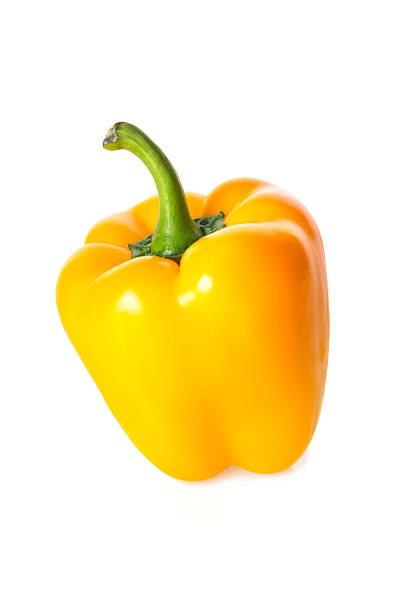 gelbe paprika paprika - green bell pepper stock-fotos und bilder