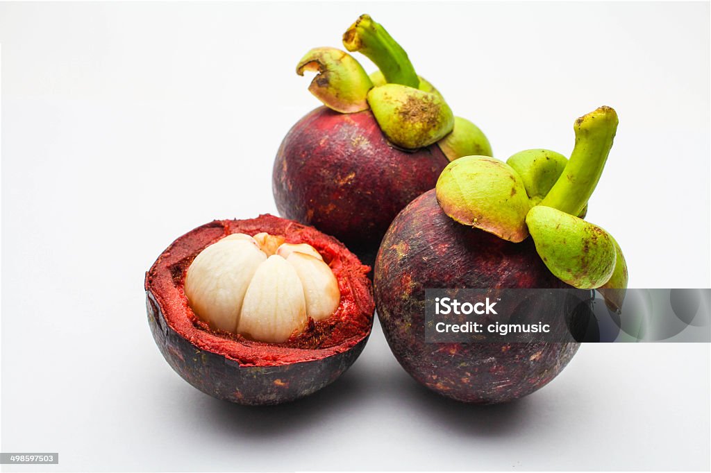 Mangosteen An isolated mangosteen on white background Asia Stock Photo