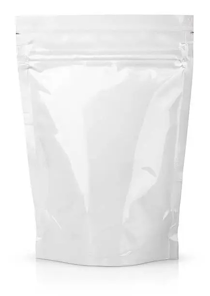 Photo of White blank foil or plastic sachet with valve and seal