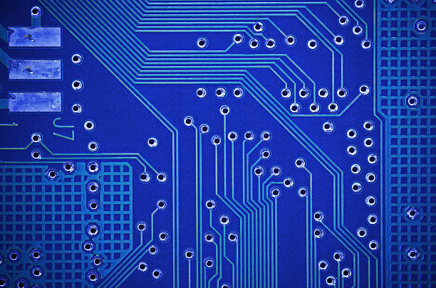 istock lines and solder joints of the modern circuit board 498601574