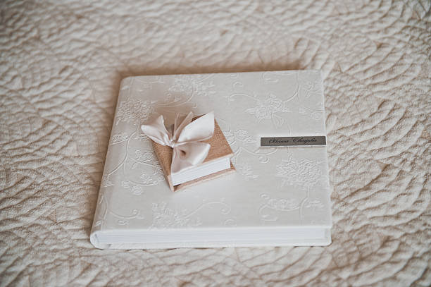 istock Book with CD and wedding photo 498606222