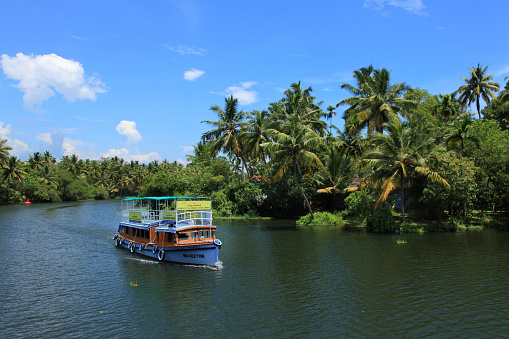 Kollam, India - April 17,2015 : Fishing boats are docked in the Ashtamudi lake in Kollam,Kerala, India. 