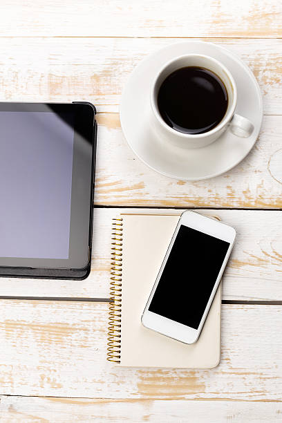 istock office working desk top view with laptop 498609378