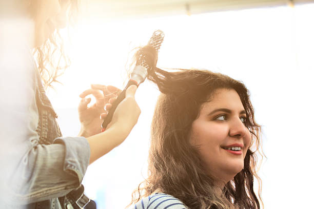 istock Hairdresser and client 498610390