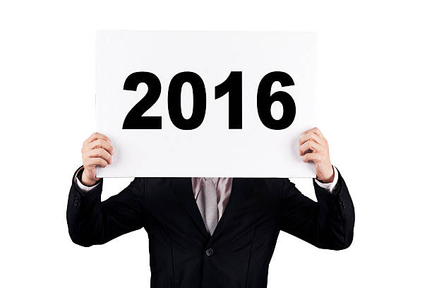 istock Entrepreneur covering his face with number 2016 498610412