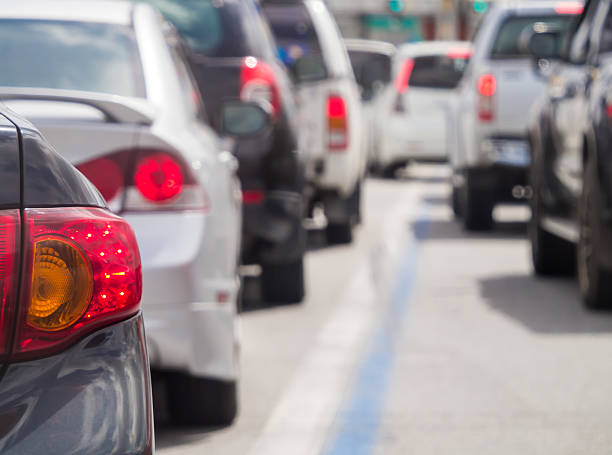 istock Car queue in the bad traffic road 498610835