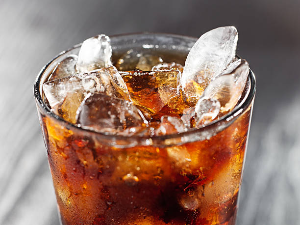 istock glass of cola with ice. 498612427