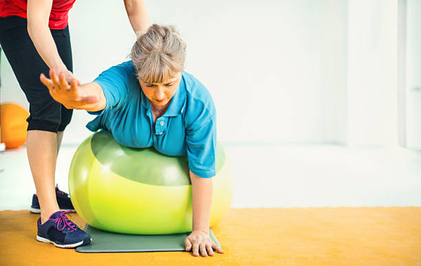 istock Weight loss exercise in a gym. 498612740