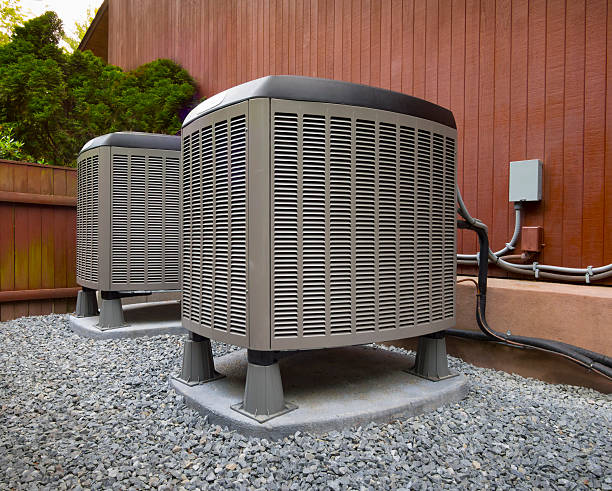 HVAC heating and air conditioning unots HVAC heating and air conditioning residential units oil pump photos stock pictures, royalty-free photos & images