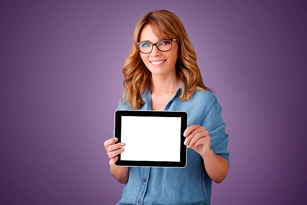 istock Professional women with digital tablet 498613678