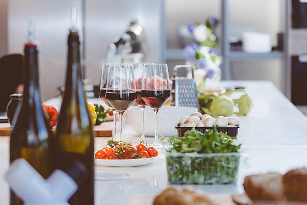 istock Vegetable, glass wine, utensils on the kitchen table 498614670