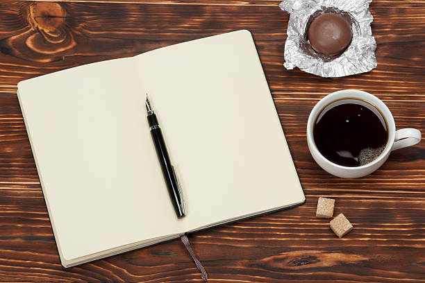 istock Blank Open Notepad. Cup Of Coffee. Wooden Background 498614680