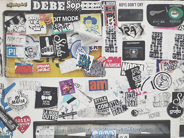 Barcelona, Spain - May 23, 2015: Grafitti on an abandoned shop and apartment building in the historical Barri Gotic area of Barcelona, Spain on May 23, 2015.