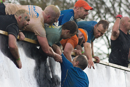 Boughton House, Northamptonshire, UK - May 4, 2013:  Tough Mudders who conquered 